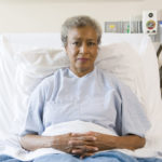 Woman in hospital bed